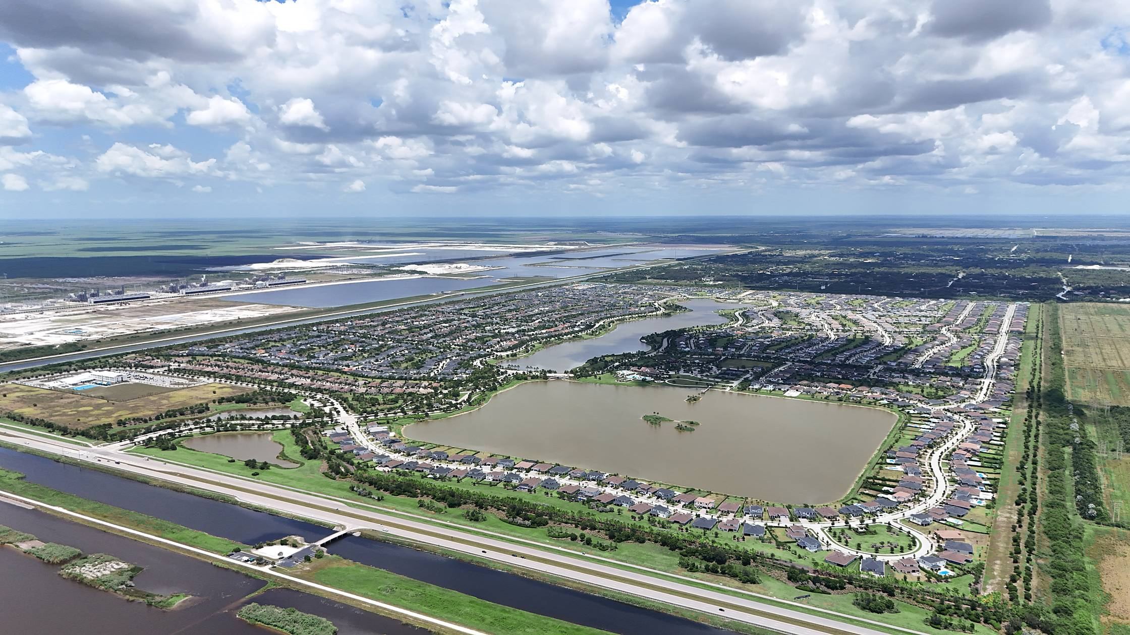 Aerial view over the full Arden community with lakes and homesites