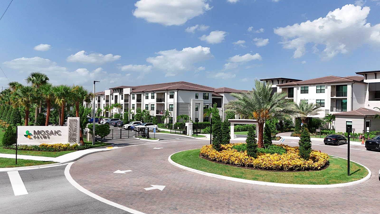 The entrance roundabout at Mosaic Palms with layered planting